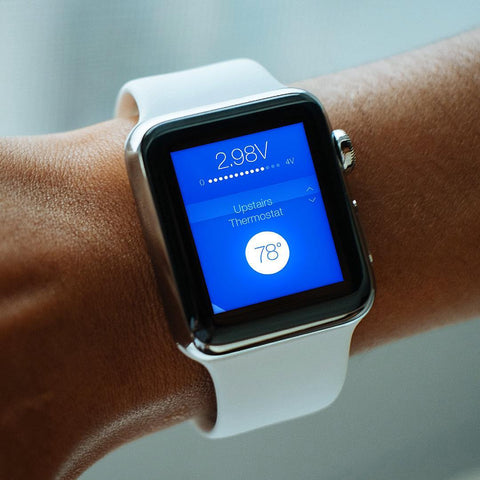 Intelligent thermostat control interface for Apple Watch featuring temperature optimization and energy management representing SirCharles.DESIGN's expertise in wearable technology and smart home integration