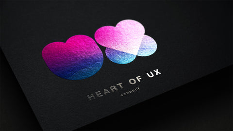 Vibrant gradient heart-shaped logos for Heart of UX Connect, demonstrating SirCharles.DESIGN's Gold award-winning logo design and Design of the Year nomination from INDIGO Design Awards 2020